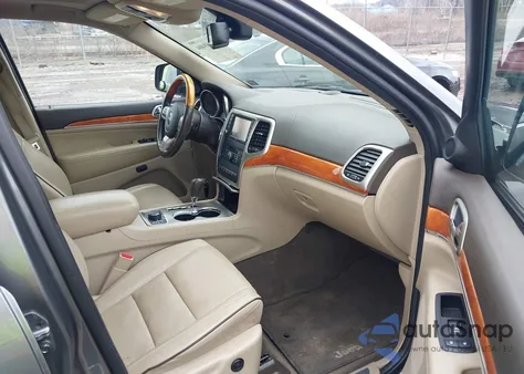 2012 Jeep Grand Cherokee Overland z USA, uszkodzony, nr VIN 1C4RJFCTXCC212064